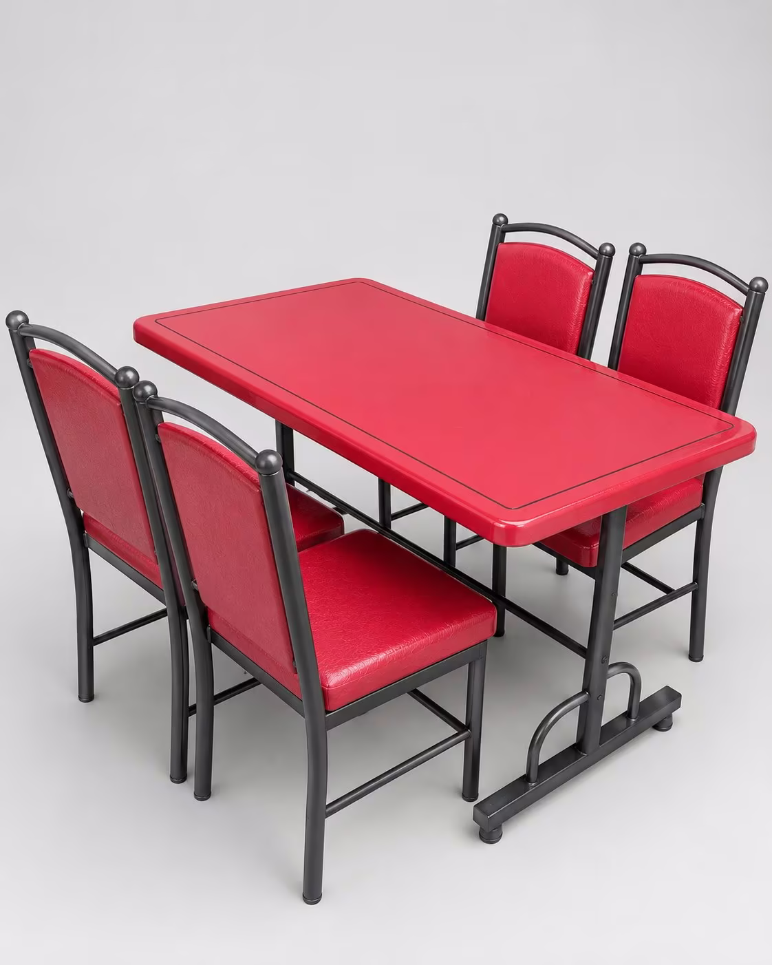 Red dining table with four chairs